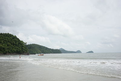 Scenic view of beach against sky