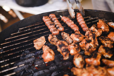 Close-up of meat on barbecue grill