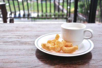 Close-up of coffee served on table