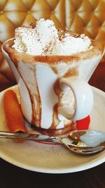 Close-up of coffee served on table