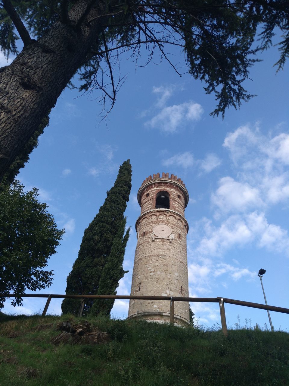 LOW ANGLE VIEW OF WATER TOWER ON CLOUDY SKY