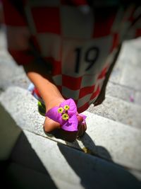 Close-up of hand holding flower