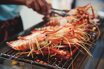 Close-up of meat on barbecue grill