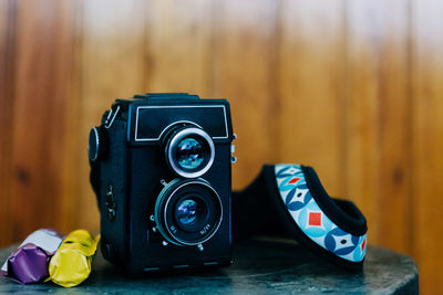 Close-up of camera on table