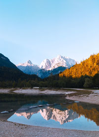 Stylish travel wallpaper. slovenia. mountains and lake. narure lover concept