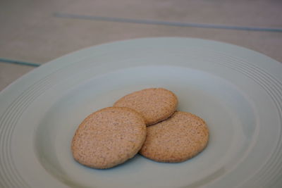 High angle view of cookies in plate