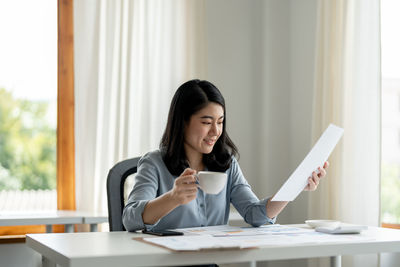 Businesswoman working at office