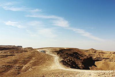 Scenic view of desert against sky