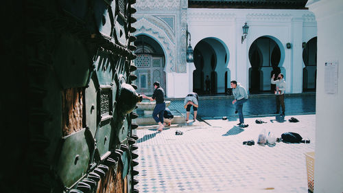 Group of people in front of building