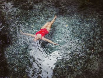 Woman relaxing in sea