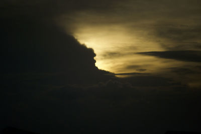 Low angle view of dramatic sky during sunset