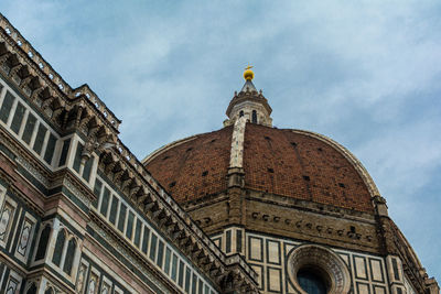 Low angle view of temple building against sky