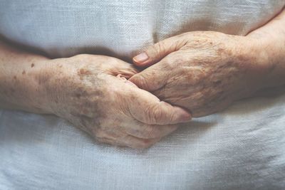 Close-up of old woman's hands
