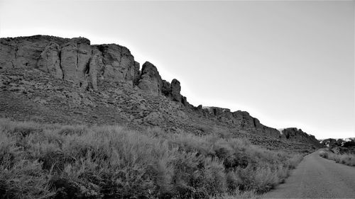 Scenic view of rocky mountains against clear sky