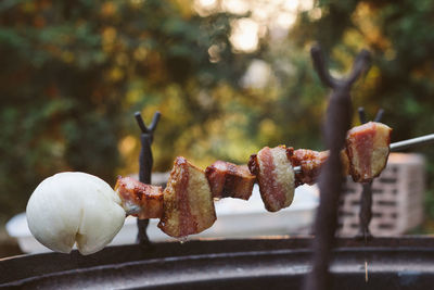 Close-up of meat on barbecue