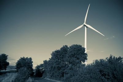 Wind turbine against sky