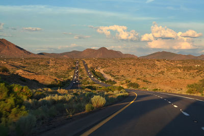 Road trip by driving on highway street to grand canyon national park at sunset, arizona