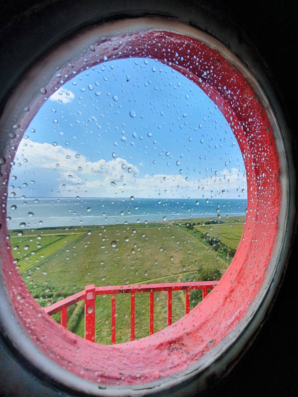 CLOSE-UP OF WET GLASS WINDOW