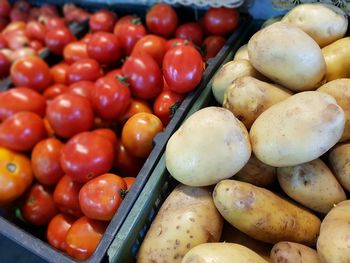 High angle view of tomatoes for sale at market stall
