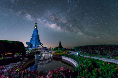 Panoramic view of temple building against sky at night