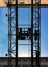 Low angle view of built structure against blue sky