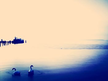 Boat in sea against sky