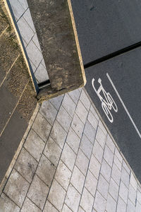 High angle view of arrow sign on road