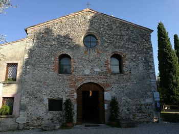 Low angle view of historic building against sky