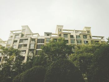 Low angle view of buildings against clear sky