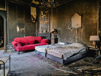 Empty chair in abandoned building