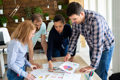 Business colleagues working at office