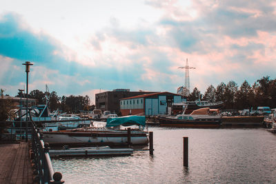 Boats moored at harbor