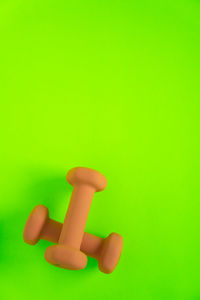 Close-up of toy over green background