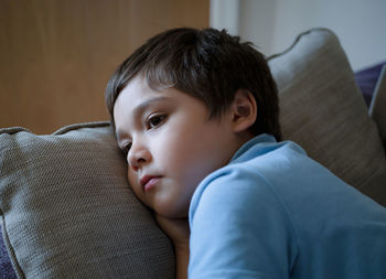 Portrait of boy relaxing at home