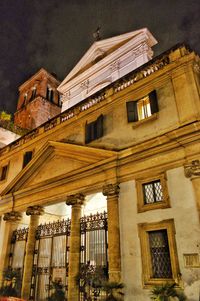 Low angle view of historical building against sky at night