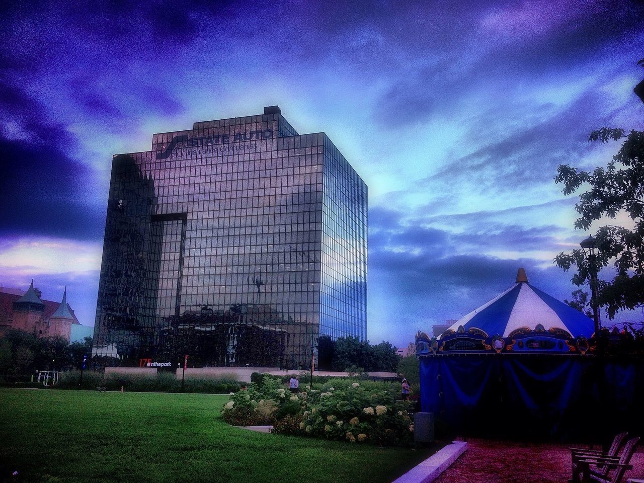 architecture, built structure, building exterior, sky, cloud - sky, illuminated, tree, cloud, night, blue, cloudy, dusk, city, grass, modern, low angle view, outdoors, tower, building, no people