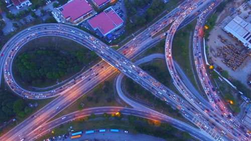 High angle view of light trails on elevated road