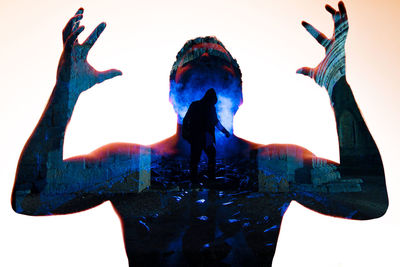 Low angle view of woman against clear sky