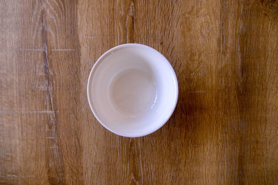 High angle view of empty coffee cup on table