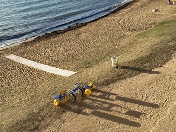 High angle view of shadow on sand at beach