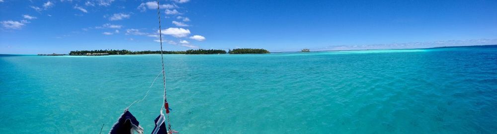 Scenic view of sea against blue sky