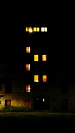 View of illuminated buildings at night