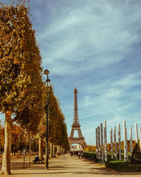 Low angle view of tower against cloudy sky