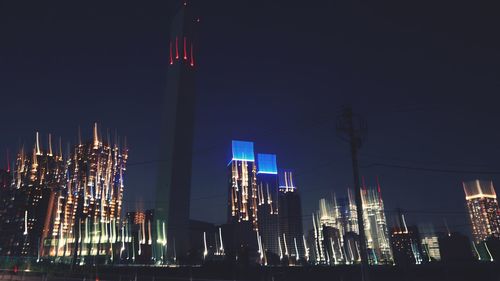 View of illuminated city at night