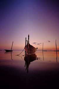 Scenic view of sea at sunset