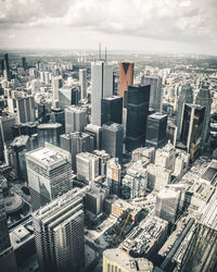 High angle view of modern buildings in city against sky