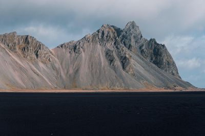 Scenic view of rocky mountains against sky