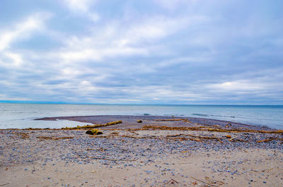 Scenic view of beach against sky