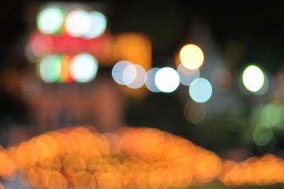 Defocused image of illuminated lights at night