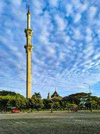 View of building against cloudy sky